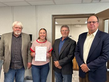National 4-H Week is October 5-11 - Cheyenne County District VI President Kallie Ball accepts signed proclamation from Cheyenne County Commissioners