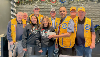 Lamar Lions Club donates to the Prowers County Toys for Tots program